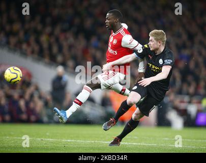 L-R Nicolas Pepe von Arsenal und Kevin De Bruyne von Manchester City während der englischen Premier League zwischen Arsenal und Manchester City am 15. Dezember 2019 im Emirates Stadium in London, England. (Foto von Action Foto Sport/NurPhoto) Stockfoto