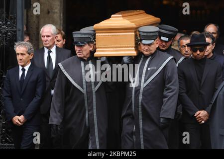 Der ehemalige Formel-1-Weltmeister Alain Pros und der aktuelle Formel-1-Weltmeister Lewis Hamilton gehen am 29. Mai 2019 bei Niki Laudas Begräbnis am Stephansdom in Wien, Österreich, an einem Sarg vorbei. (Foto von Jakub Porzycki/NurPhoto) Stockfoto