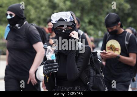 Protestierende der Freedom Fighter DC Bewegung marschieren am 28. August 2020 in Washington DC, USA, gegen die Brutalität der Polizei und definanzieren die Polizei. (Foto von Lenin Nolly/NurPhoto) Stockfoto