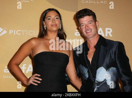 April Love Geary und Robin Thicke nehmen am 03. November 2022 an der amfAR Gala 2022 in Los Angeles im Pacific Design Center in West Hollywood, Kalifornien, Teil. Foto: Crash/imageSPACE/Sipa USA Stockfoto