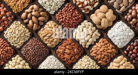 Mischen Sie Nüsse Hintergrund, große Auswahl an Samen. Rohe Lebensmittel: Pecan, Haselnüsse, Walnüsse, Pistazien, Mandeln, Macadamia, Cashew, Erdnuss und andere Stockfoto