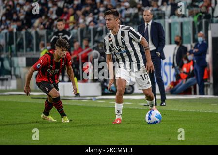 Paulo Dybala vom FC Juventus und Brahim Diaz vom AC Mailand sowie während des Serie-A-Spiels zwischen dem FC Juventus und dem AC Mailand im Allianz-Stadion in Turin am 19. September 2021 in Italien (Foto: Alberto Gandolfo/NurPhoto) Stockfoto