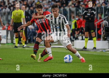 Paulo Dybala vom FC Juventus und Brahim Diaz vom AC Mailand sowie während des Serie-A-Spiels zwischen dem FC Juventus und dem AC Mailand im Allianz-Stadion in Turin am 19. September 2021 in Italien (Foto: Alberto Gandolfo/NurPhoto) Stockfoto