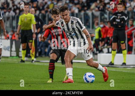 Paulo Dybala vom FC Juventus und Brahim Diaz vom AC Mailand sowie während des Serie-A-Spiels zwischen dem FC Juventus und dem AC Mailand im Allianz-Stadion in Turin am 19. September 2021 in Italien (Foto: Alberto Gandolfo/NurPhoto) Stockfoto