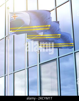 Fahnenmasten mit der Flagge von Aruba vor dem Business Center Stockfoto