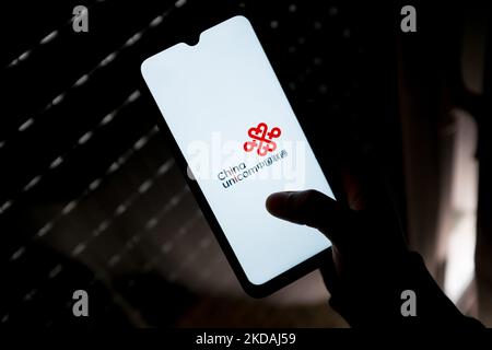 In dieser Abbildung ist ein China Unicom-Logo zu sehen, das am 21. Mai 2022 auf einem Smartphone-Bildschirm in Athen, Griechenland, zu sehen ist. (Foto von Nikolas Kokovlis/NurPhoto) Stockfoto