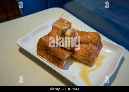 Ein Teller mit süßem und goldenem West Toast im Hong Kong-Stil Stockfoto