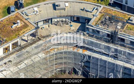 Luftaufnahme, Sanierung nach Großbrand im Wohngebäude Grüne Mitte, verkleidete Fassade, Westviertel, Essen, Ruhrgebiet, Nordrhein-Westfalen, Deutschland Stockfoto