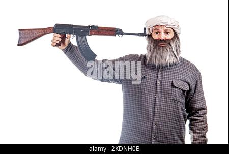 Ein bärtiger Mann hält seine Waffe an den Kopf Stockfoto