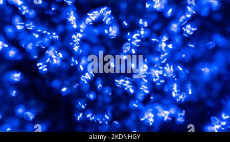 Blauer Bokeh Hintergrund durch Neonlichter geschaffen. Hochwertige Fotos Stockfoto