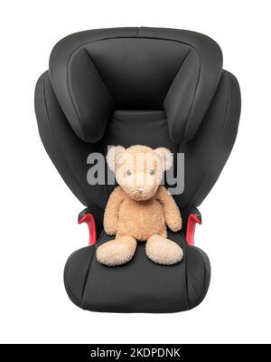 Weicher Spielzeugbär auf einem Kinderautositz. Stockfoto