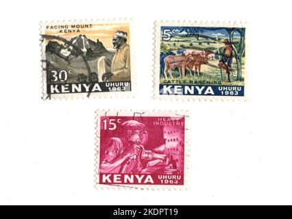 Eine Montage von Vintage-Briefmarken aus Kenia auf weißem Hintergrund. Stockfoto