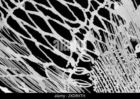 Stoff schwarz weiß Muster vintage Material Hintergrund abstraktes Design Textur Textil. Stockfoto