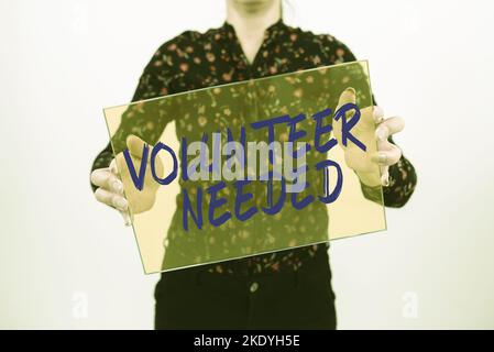 Schild zeigt Freiwilliger benötigt, Internet-Konzept brauchen Arbeit oder Hilfe für die Organisation, ohne bezahlt zu werden Stockfoto