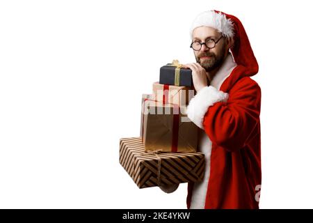 Santa Claus holding präsentiert Stockfoto