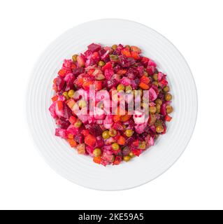Vinaigrette, Gemüsesalat mit Erbsen und Sauerkraut isoliert auf weißem Hintergrund. Stockfoto