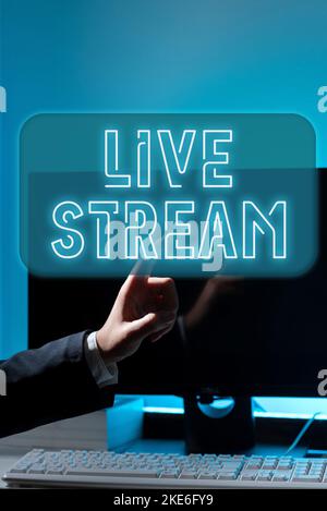 Hand schreiben Zeichen Live Stream. Geschäftsansatz zur Übertragung von Video- oder Audiomaterial über das Internet Stockfoto
