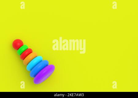 Spielzeug Pyramide Turm in der Ecke auf gelbem Hintergrund. Kindererziehung. Lernspiele. Vorschulentwicklung. Speicherplatz kopieren. Draufsicht. 3D Rendern Stockfoto