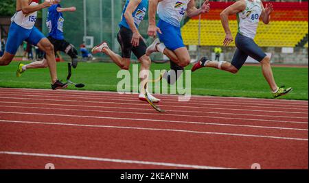 Gruppenläufer Paraathlet Lauf Sprint-Rennen Stockfoto