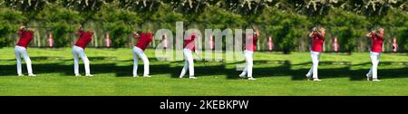 Braunschweig, 18. Mai 2019: Durchgehender Abschlag beim Golf, ältere Dame in weißer Hose und rotem Hemd trifft den Golfball über dem Grün, Co Stockfoto