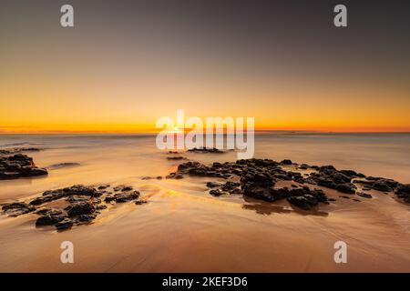 Der Sonnenuntergang am Bunbury Beach in Western Australia Stockfoto