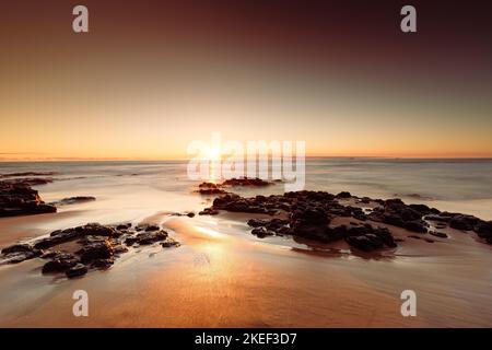 Der Sonnenuntergang am Bunbury Beach in Western Australia Stockfoto