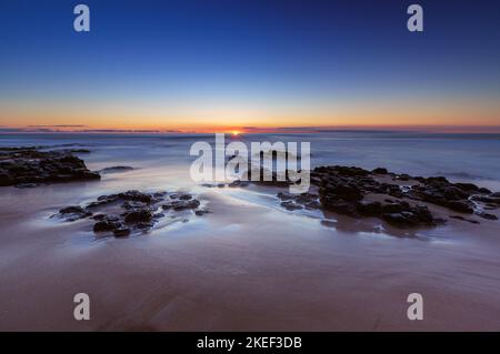 Der Sonnenuntergang am Bunbury Beach in Western Australia Stockfoto