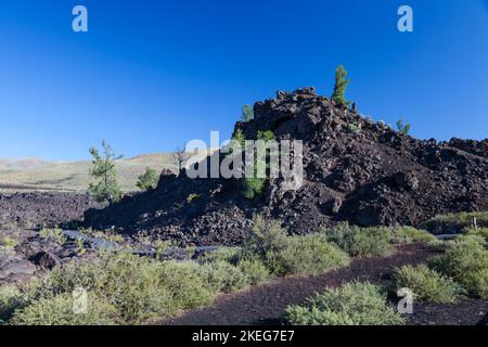 Gelände in Kratern des Mondes National Monument und Bewahren in Idaho. Die National Park Service beschreibt den Park als "ein riesiges Meer von Lava f Stockfoto