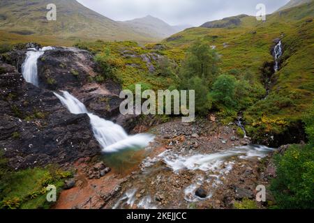 Das Treffen der drei Gewässer am Fuße der drei Schwestern von Glencoe, Schottland, Großbritannien Stockfoto