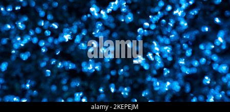 Blauer Bokeh Hintergrund durch Neonlichter geschaffen. Hochwertige Fotos Stockfoto