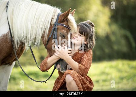 Mädchen und pony Stockfoto