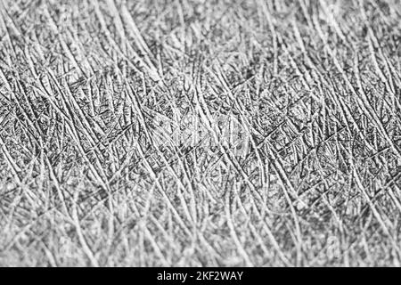 Abstrakter Hintergrund aus silbernem Filament Stockfoto