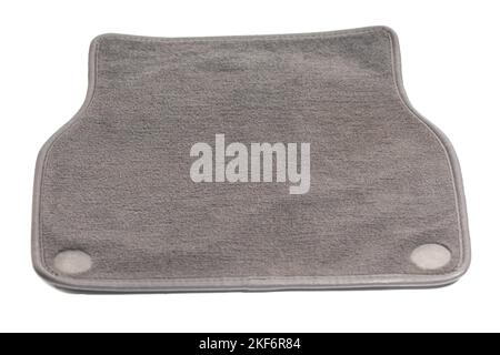 Textile Bodenmatte für Autos isoliert auf weißem Hintergrund. Stockfoto