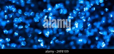Blauer Bokeh Hintergrund durch Neonlichter geschaffen. Hochwertige Fotos Stockfoto