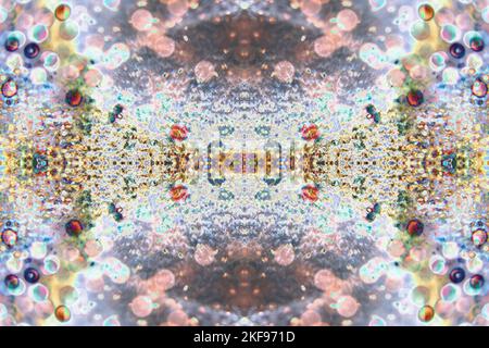 Abstrakter Hintergrund aus vielen verschwommenen Punkten und Kreisen in einem mehrfarbigen Hintergrund, abstrakter farbiger Hintergrund in Bokeh Stockfoto