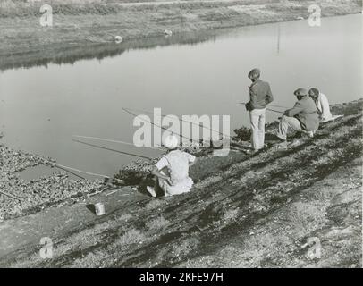 Afroamerikanische Wanderarbeiter, die in Belle Glade, Florida, fischen, Januar 1939. Stockfoto