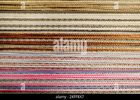 Gewebte Textur mehrfarbigen Hintergrund. Nahtloser Stoffhintergrund. Stockfoto