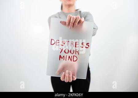 Textzeichen mit „Destress Your Mind“. Wort für, um geistige Spannungen zu lösen, Stress zu verringern Stockfoto