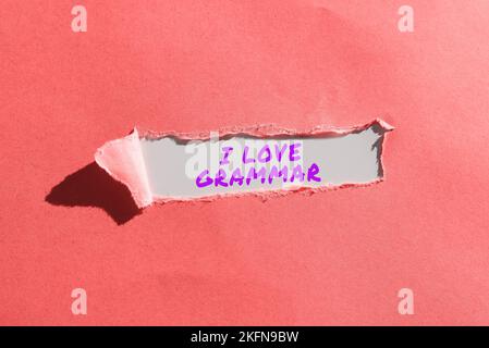 Schreiben mit Text „I Love Grammar“. Wort für Akt der Bewunderung des Systems und der Struktur der Sprache Stockfoto