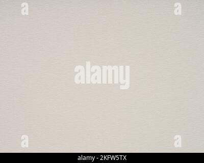 Weiches beigefarbenes Recyclingpapier, Hintergrund. Textur für die Erstellung von Karten, Texten, Schriftzügen, Wandschonern oder Kunstwerken für das Weihnachtsfest der Wintersaison. Stockfoto