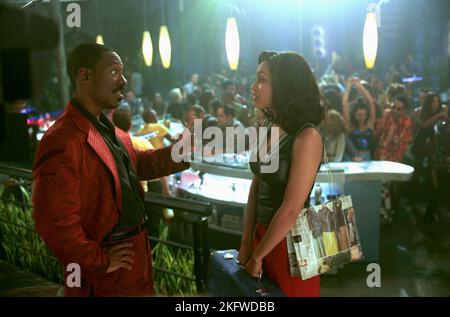 EDDIE MURPHY, ROSARIO DAWSON, DIE ABENTEUER VON PLUTO NASH, 2002 Stockfoto