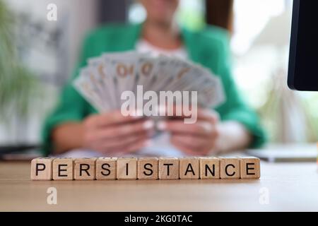 Persistenz Wort mit Holzwürfeln in Reihe gesammelt Stockfoto