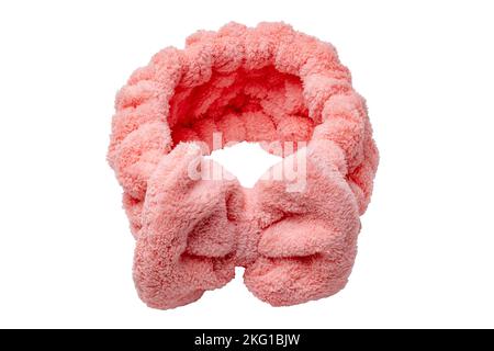 Pinkfarbenes Haarband aus hochwertigem Korallenvlies, das superweich und hautfreundlich ist. Haarband zum Waschen von Gesicht, Make-up, Duschen, Haut- und Schönheitspflege Stockfoto