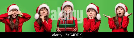 Das fröhliche, lächelnde Mädchen mit Weihnachtsmannmütze ist mit den Neujahrsgeschenken zufrieden. Andere Emotionen. Frohe Weihnachten. Isoliert auf grünem Hintergrund. Hochwertiges Foto Stockfoto