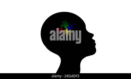 Kind Junge Kopf Profil Silhouette mit Mosaik Symbol des Autismus. Ein Puzzle, das die Störung des Autismus-Spektrums und das Bewusstsein für Neurodiversität symbolisiert Stockfoto