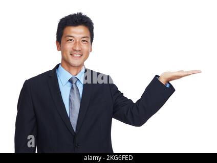 Willkommen im Unternehmen. Eine vereinzelte Aufnahme eines glücklichen jungen Geschäftsmannes, der eine Präsentation hält. Stockfoto