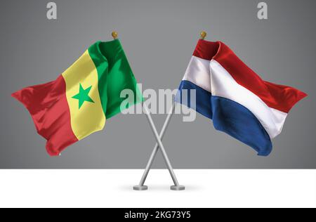 3D Darstellung von zwei Wavy Crossed Flags of Netherlands and Senegal, Zeichen der niederländischen und senegalesischen Beziehungen Stockfoto