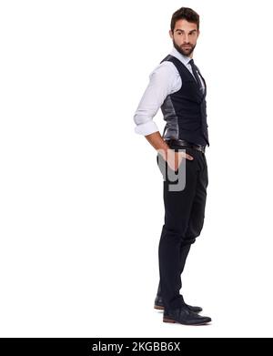 Er ist für den Erfolg gekleidet. Gesamtbild eines gut gekleideten jungen Mannes vor weißem Hintergrund. Stockfoto