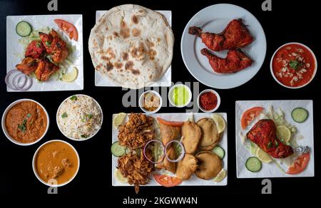 Indische Dishe kulinarisches Still Life. Gemischte indische Gerichte, Blick von oben Stockfoto