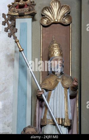 Statue des Heiligen Fabian auf dem Altar des Heiligen Geistes in der Pfarrkirche St. Katharina von Alexandria in Ribnicki Kunic, Kroat Stockfoto